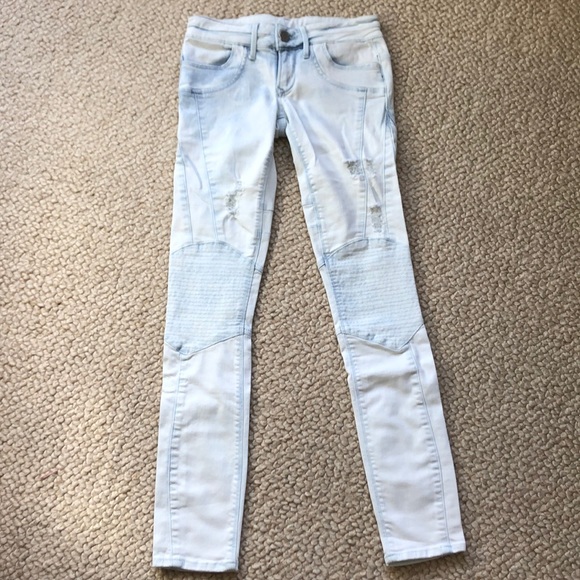 distressed moto jeans